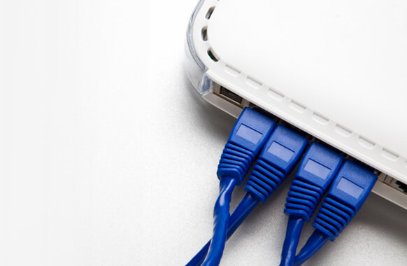 Blue Ethernet cables plugged in