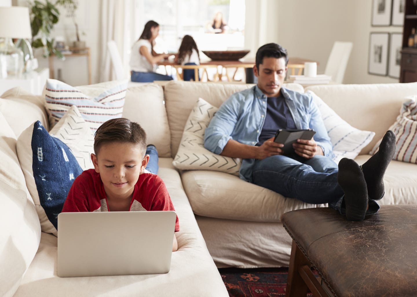 A family all using their devices at the same time